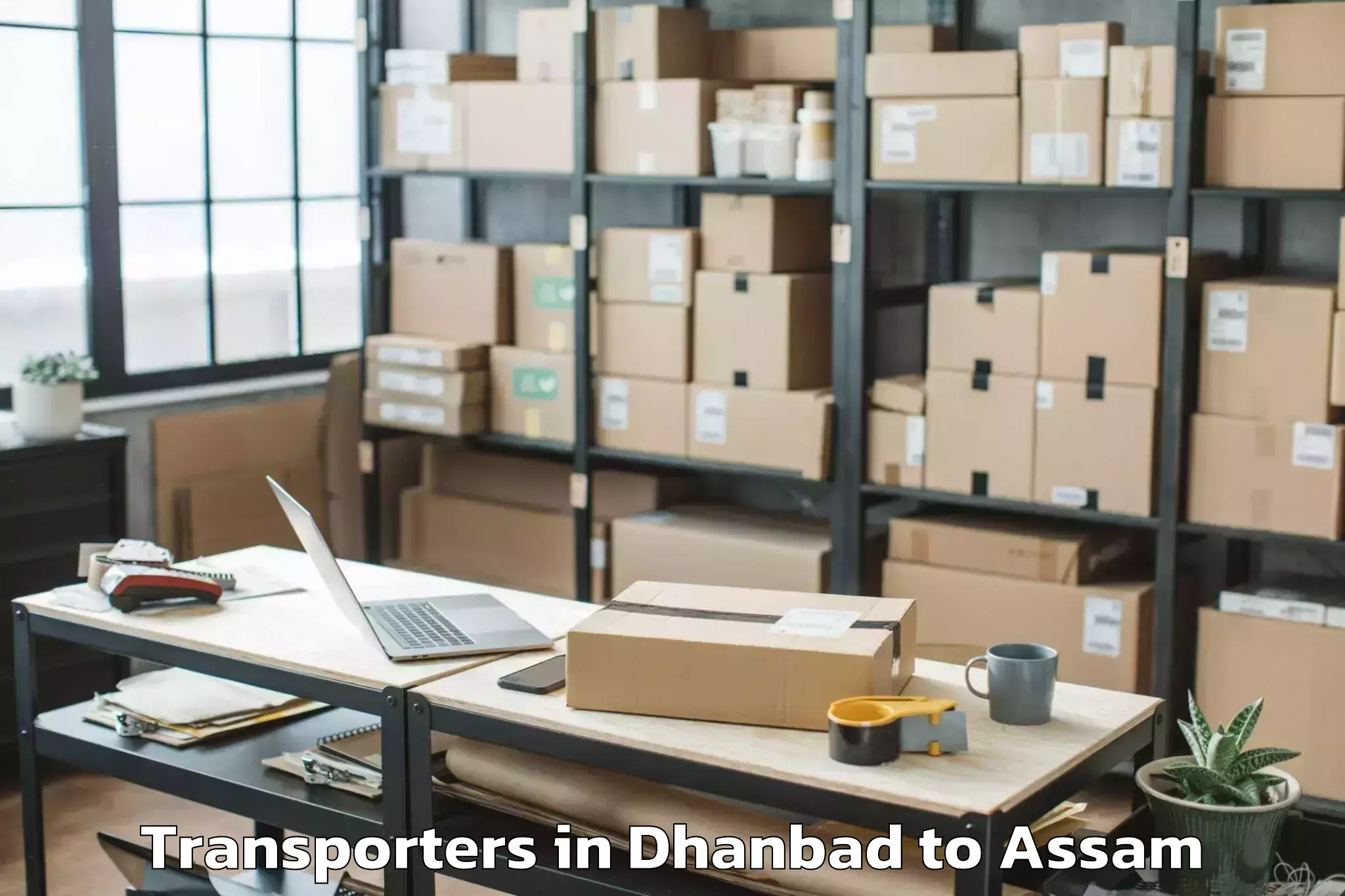 Top Dhanbad to Sonari Charaideo Transporters Available